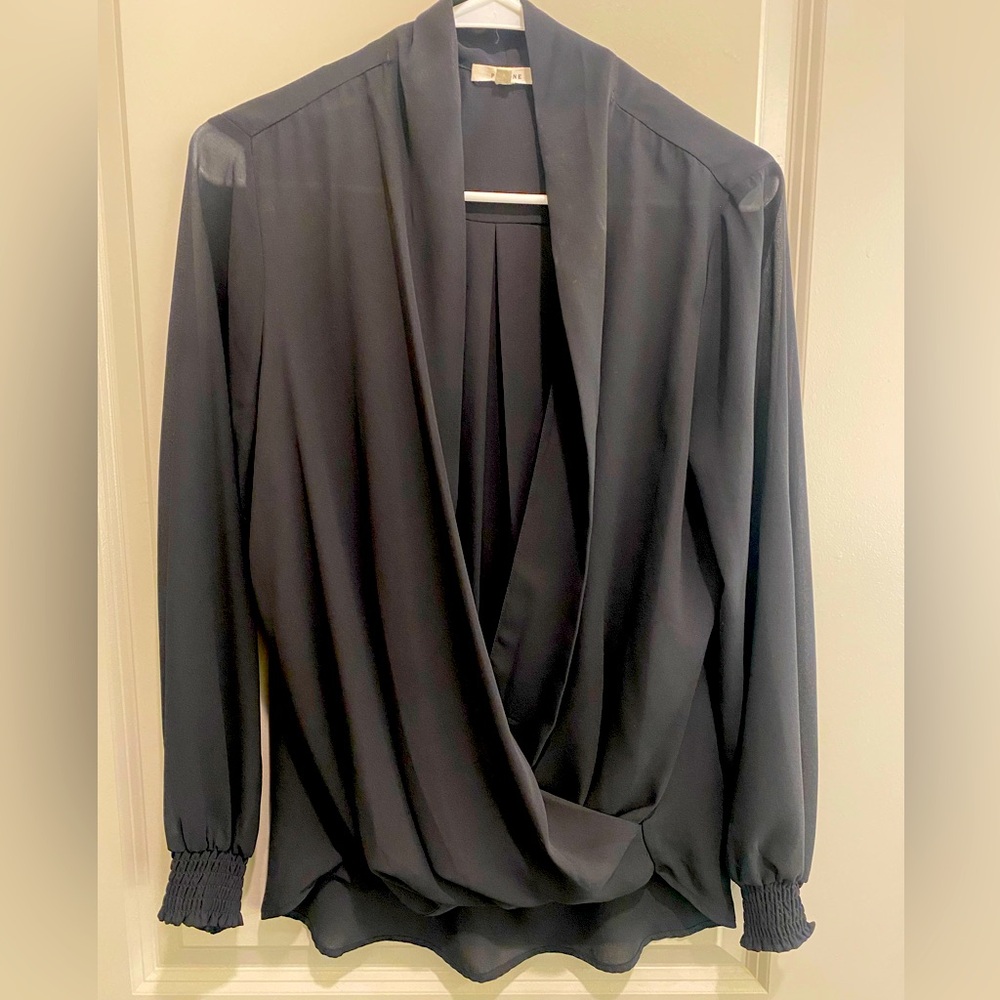 Black v neck blouse. Size M. Super flattering!
